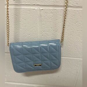 Aldo mini sling. Never worn.